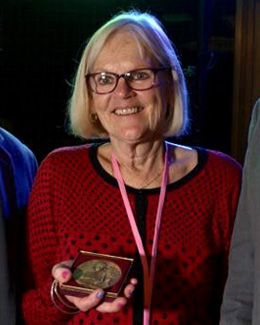 Jennifer Lonsdale holding Schweitzer Medal