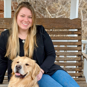 kim meneo with her golden retriever