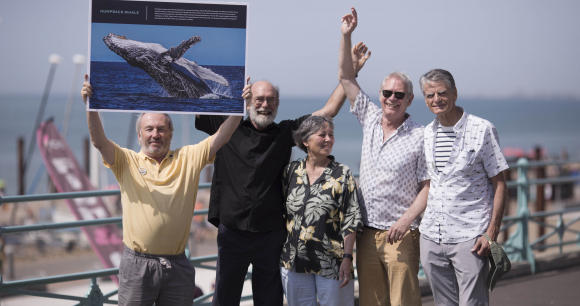 NGOs who participated in the 1982 meeting when the decision was taken celebrate on the seafront.